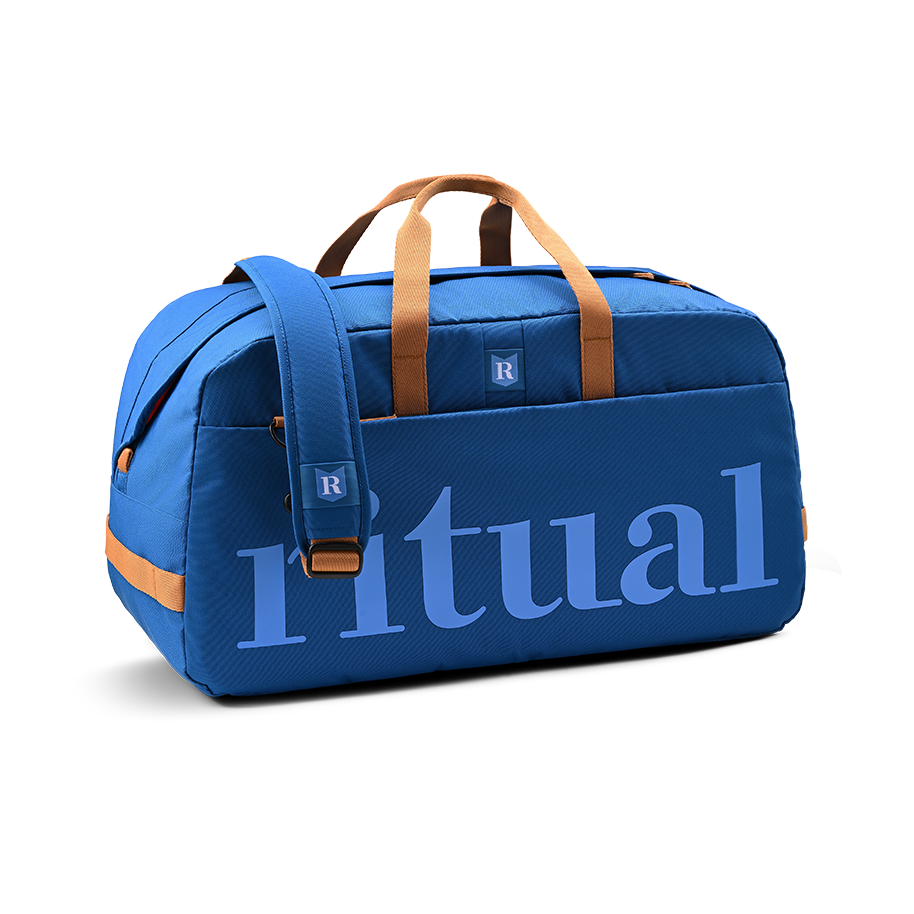 Ritual Calibre hockey duffle bag blue with brown accents, front and right side view