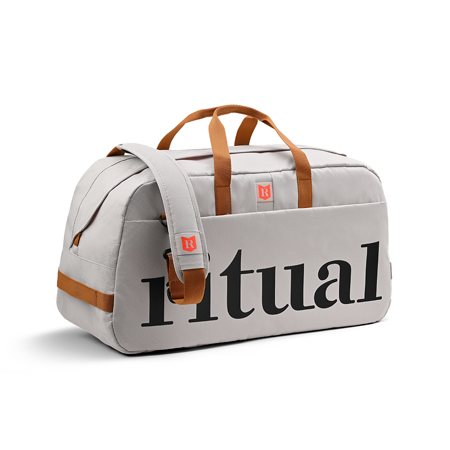 Ritual Calibre hockey duffle bag white with brown straps, front and left side view