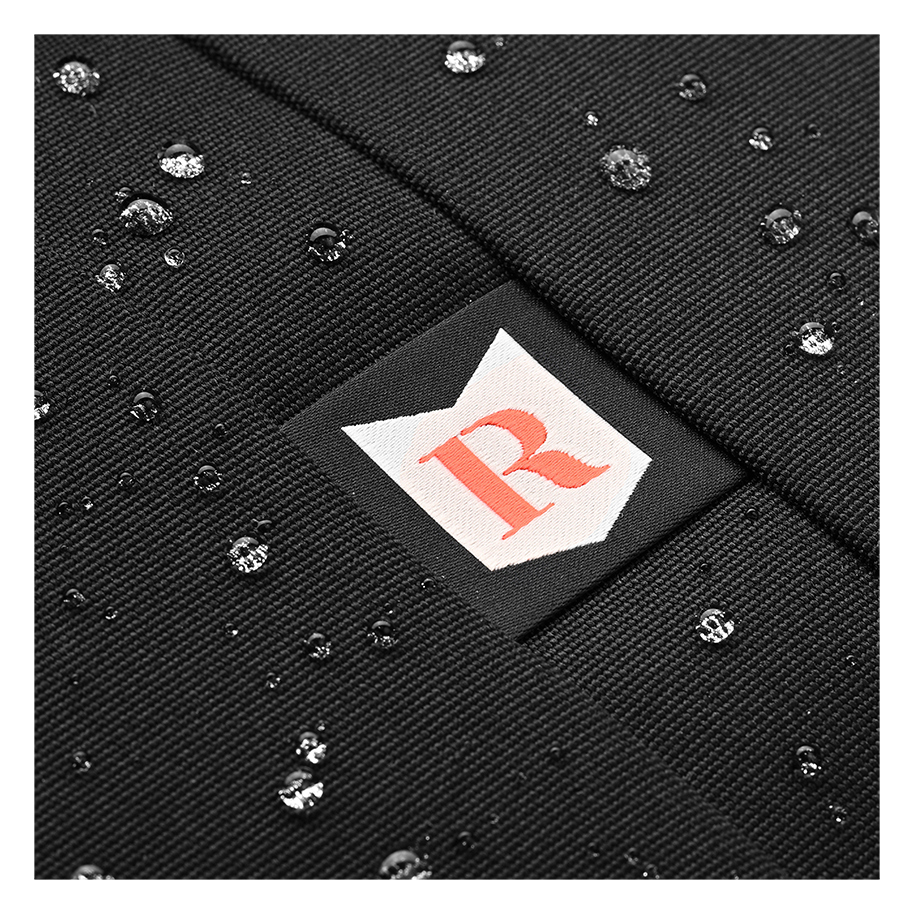 Ritual Covert hockey backpack black with water droplets and a logo patch
