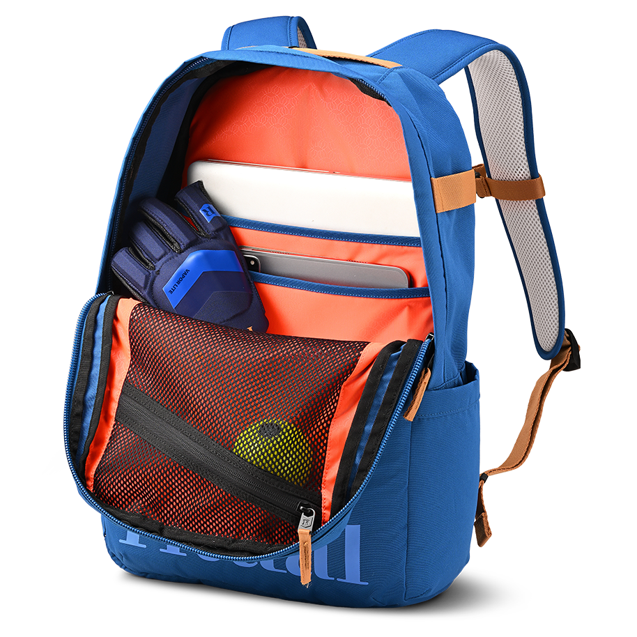 Ritual Covert hockey backpack blue with orange interior and various compartments, inside view
