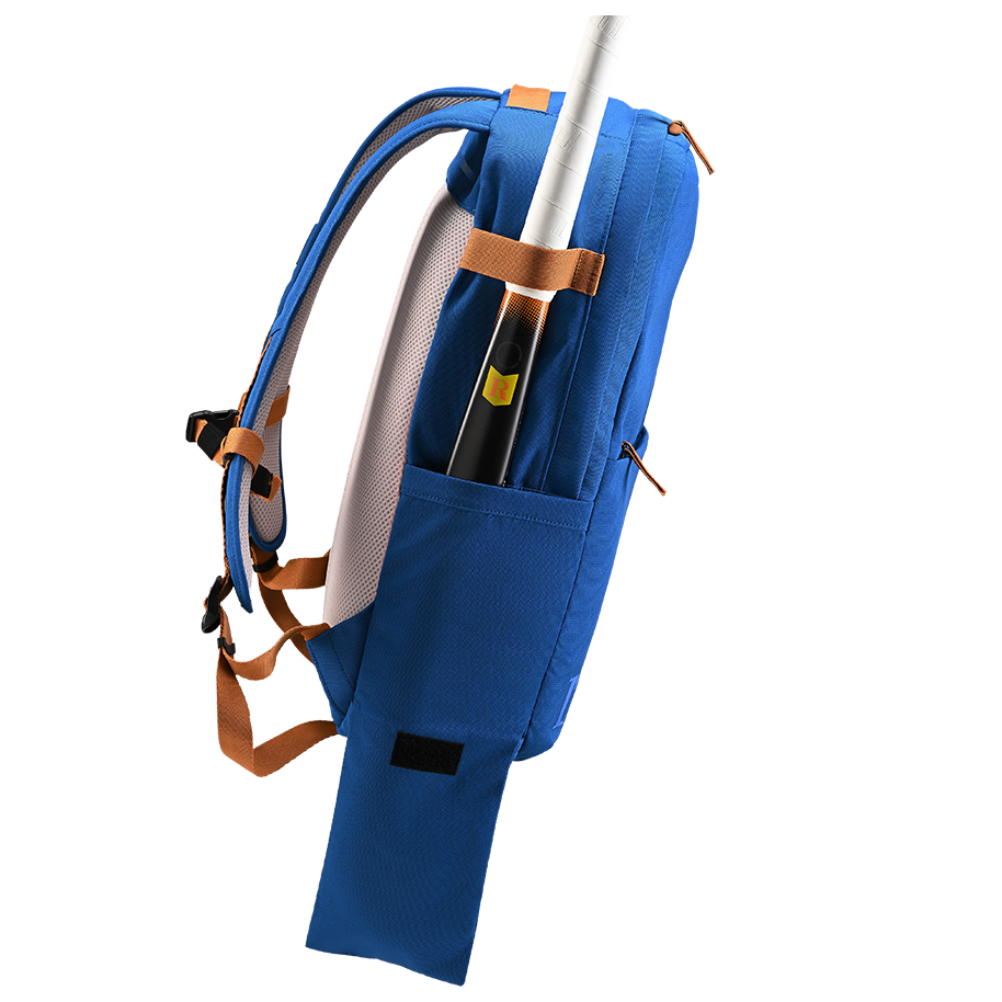 Ritual Covert hockey backpack blue with a white stick and brown straps, left side view