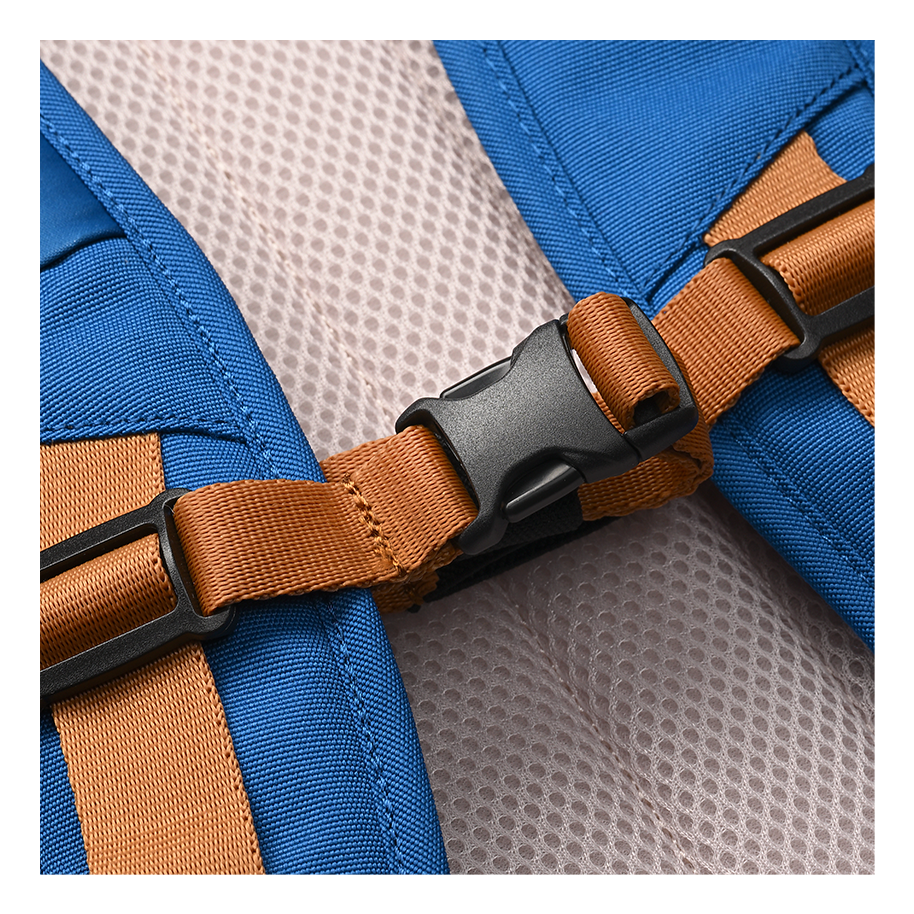 Ritual Covert hockey backpack blue with brown straps and black buckles, closeup view