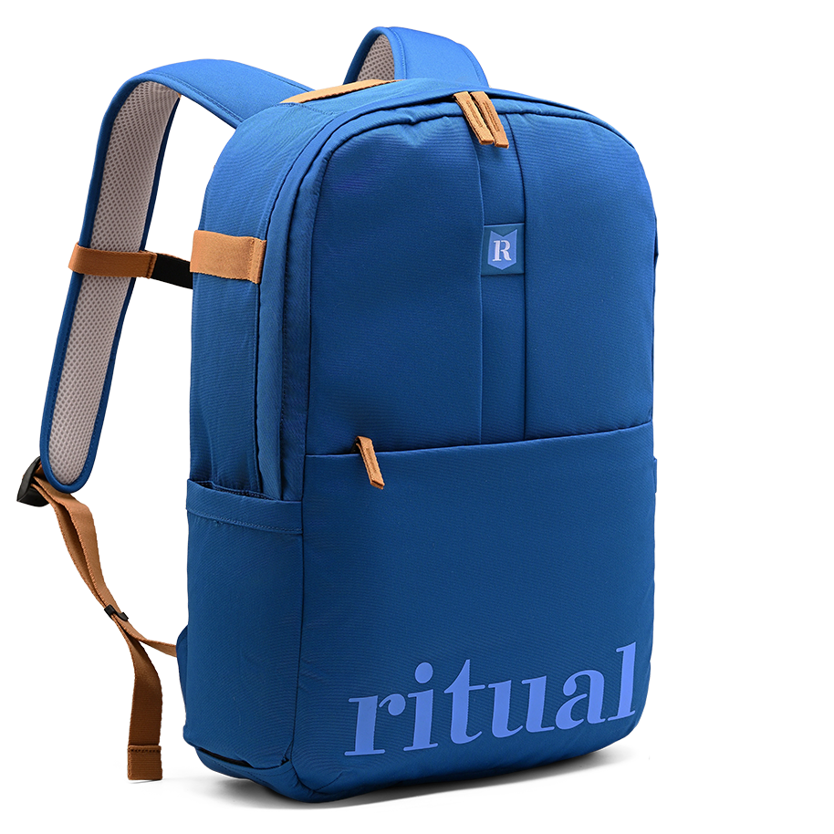 Ritual Covert hockey backpack blue with logo and bag straps, front and left view