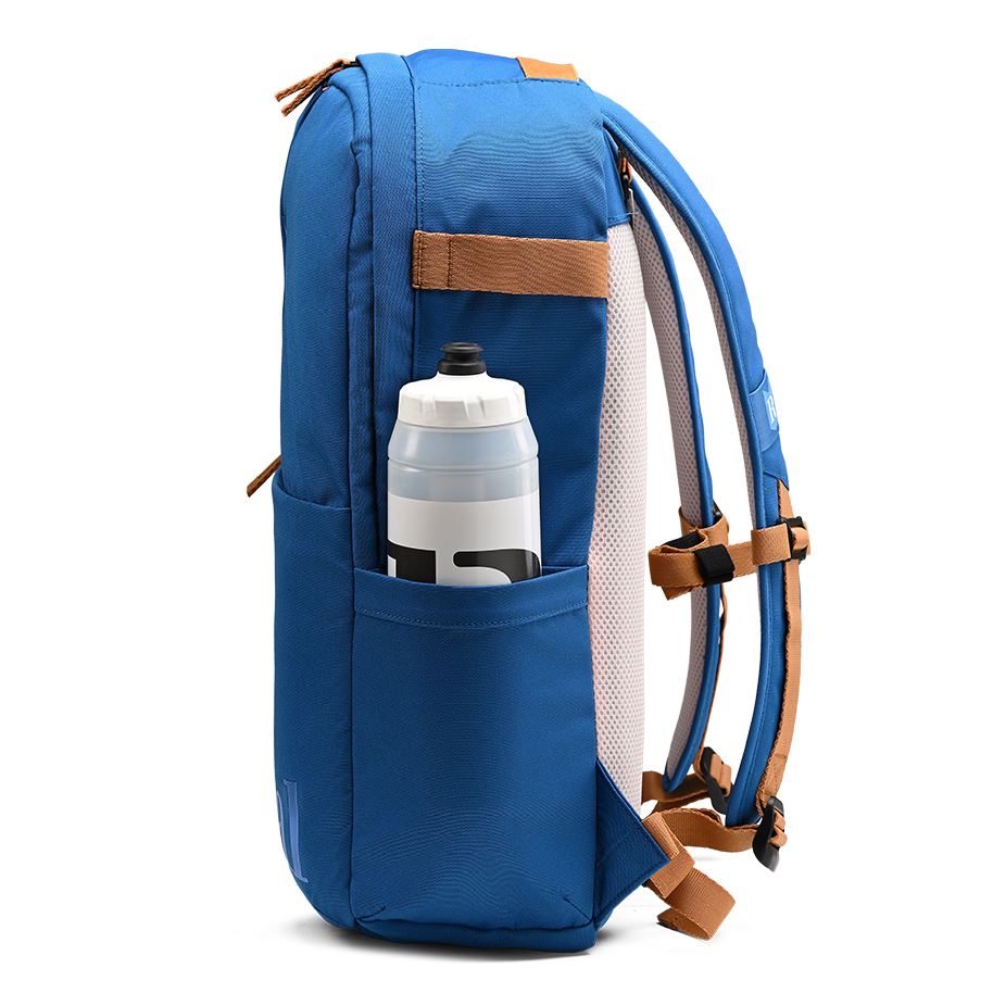 Ritual Covert hockey backpack blue with a water bottle in a pocket, right side view