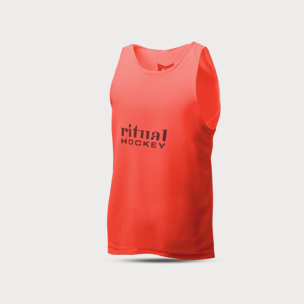 Ritual field hockey training vest, pro hockey, fluro orange hockey top, front ritual hockey logo