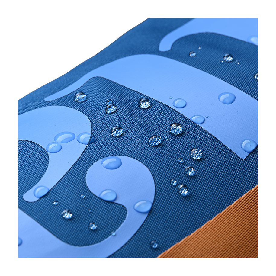 Ritual Tactic combo hockey bag blue with water droplets on logo, close-up view